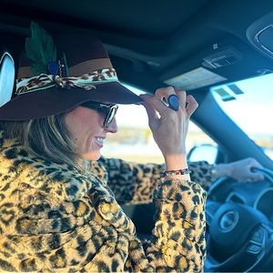 100% brown wool hat with hand made ribbon decor with genuine Lapis stone.